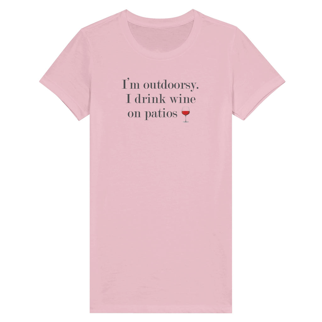 Pink premium women's tee with "I'm outdoorsy. I drink wine on patios" text, ideal for wine lovers who enjoy outdoor leisure.