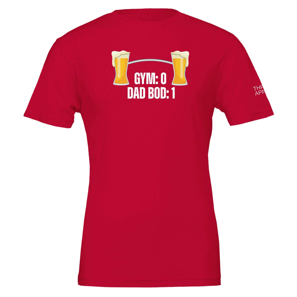 Red t-shirt displaying "Gym: 0, Dad Bod: 1" with beer glasses graphic, celebrating comfort and pride in dad bods.