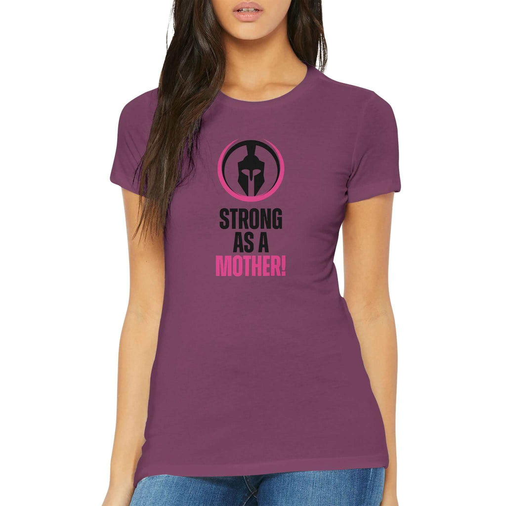 Woman wearing 'Strong as a Mother' premium women's t-shirt, part of the Female Warrior Collection, celebrating motherhood and strength