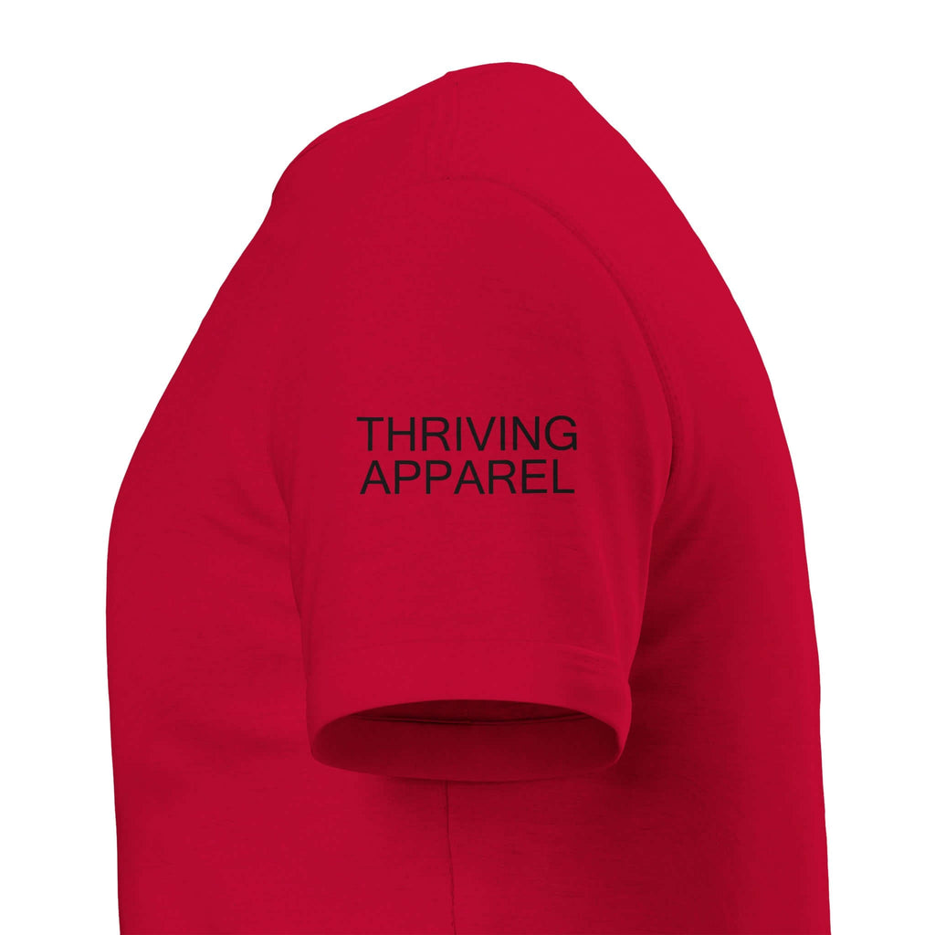 Side view of red men's tee with "THRIVING APPAREL" text on sleeve