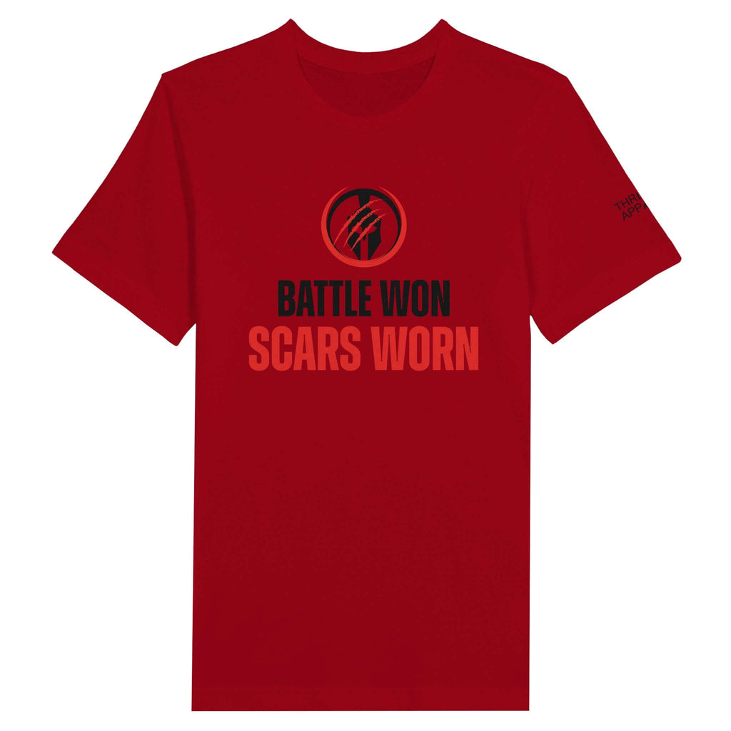 Red unisex crewneck T-shirt with "Battles Won, Scars Worn" motif and Spartan logo on front.