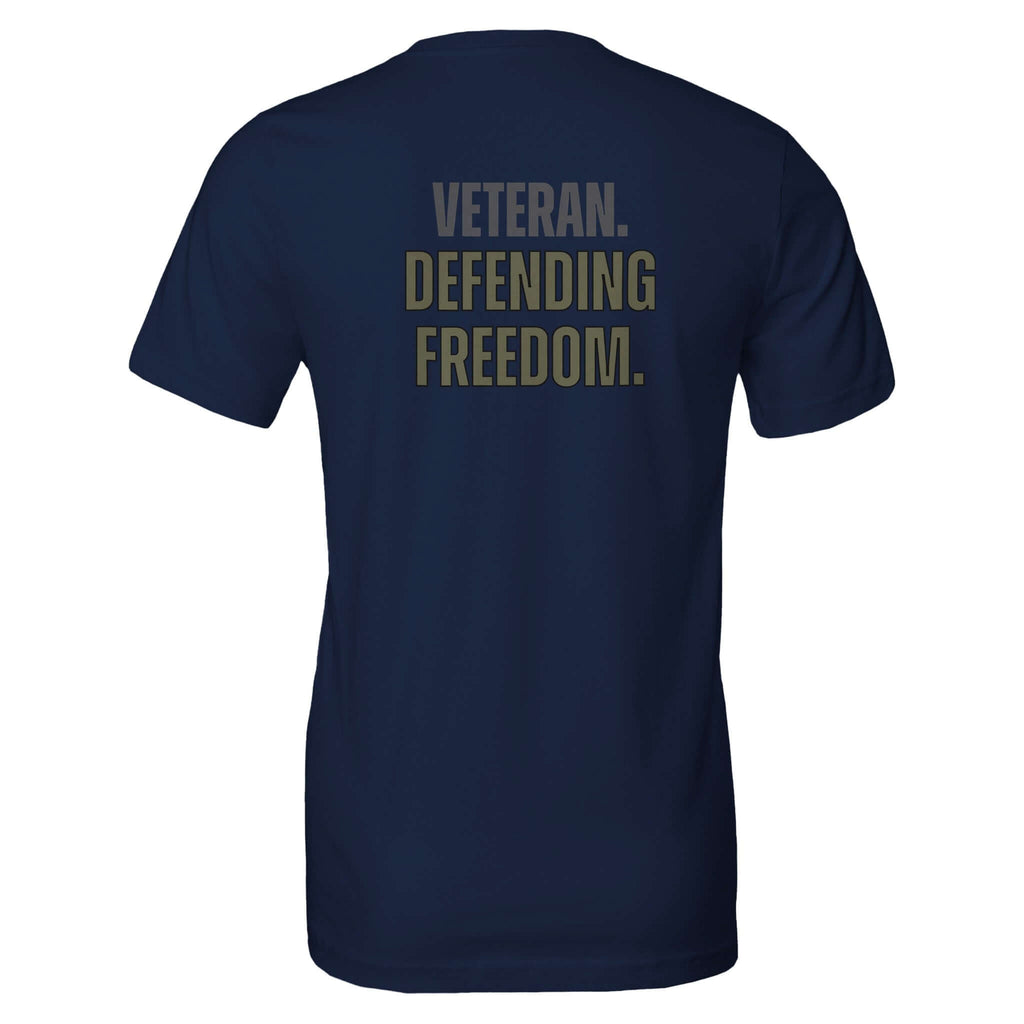 Back view of navy blue 'Veteran. Defending Freedom.' tee, made from 100% Airlume cotton with a soft feel and unisex tailored fit.