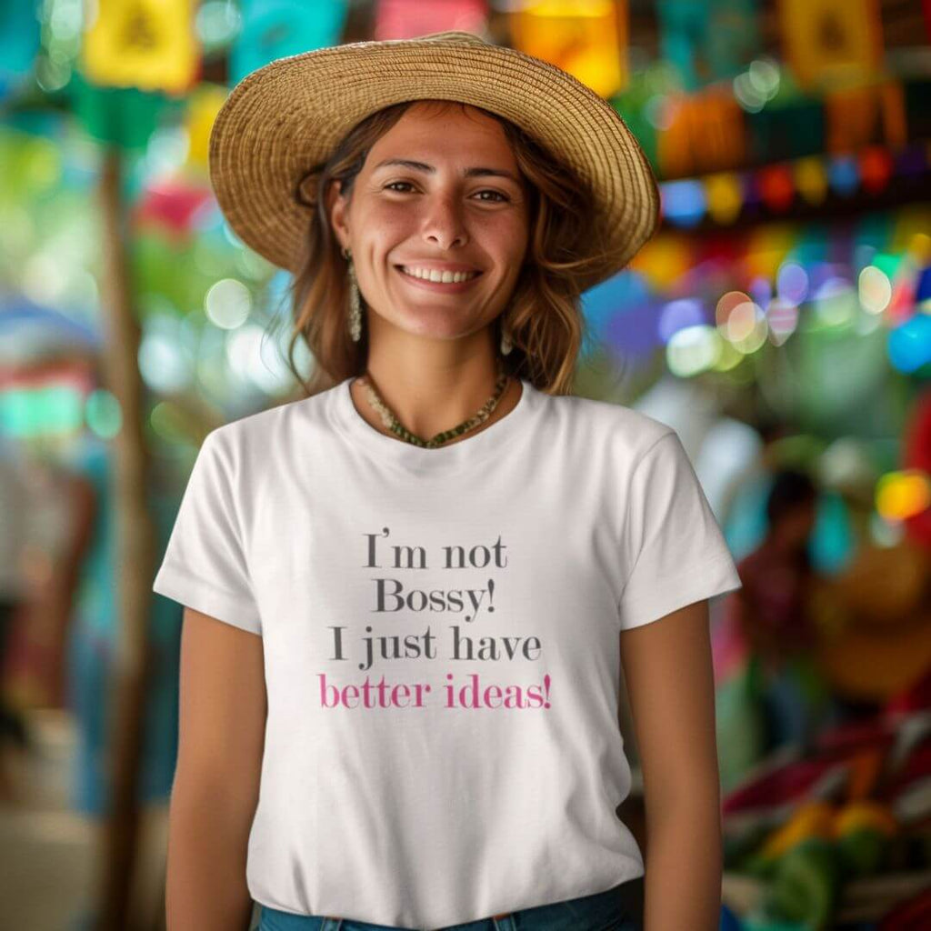 Woman wearing 'I'm not Bossy! I just have better ideas!' premium women's T-shirt from the Female Warrior Collection, smiling confidently.