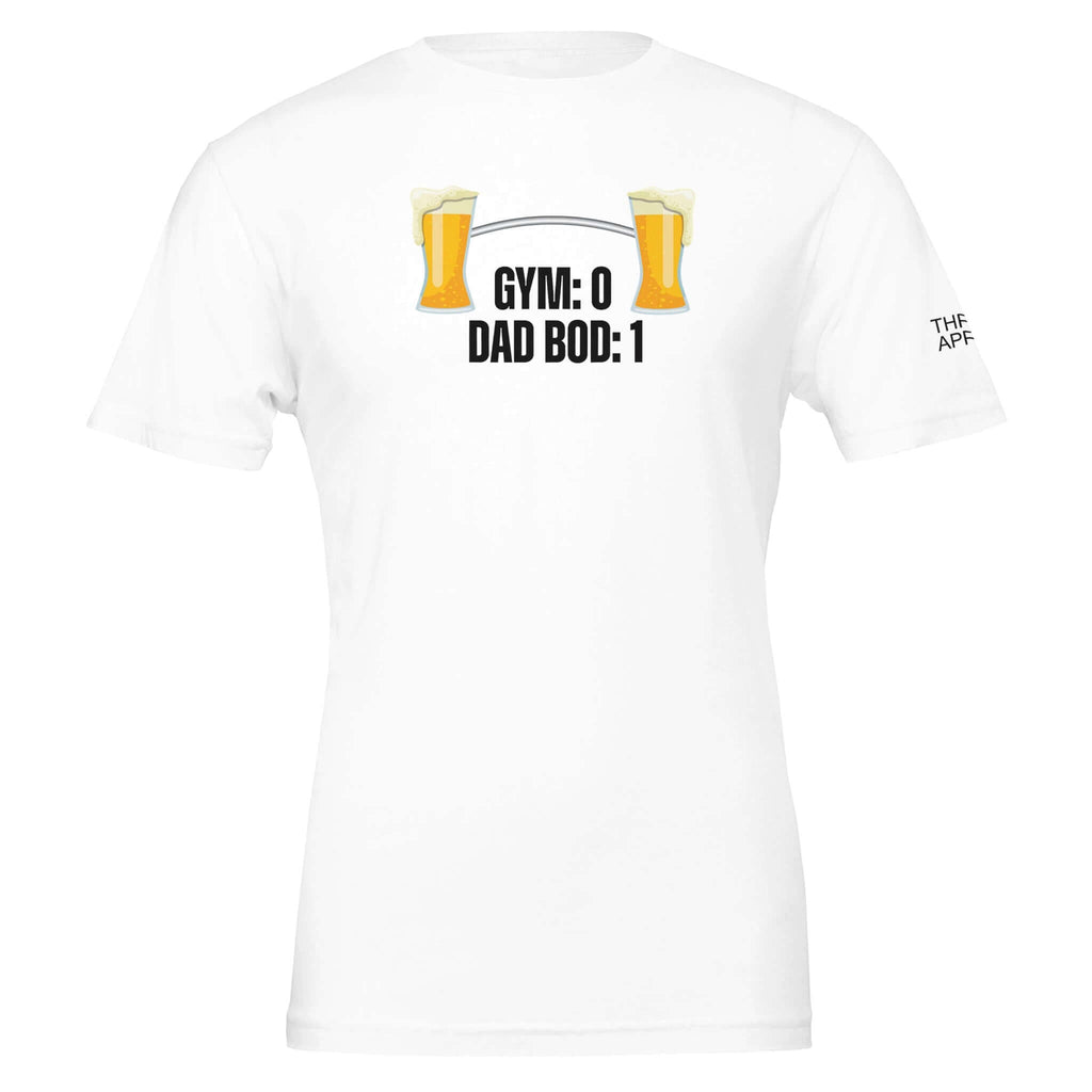 White tee with 'Gym: 0 Dad Bod: 1' text and beer glasses graphic, celebrating dad bods with comfort and humor.