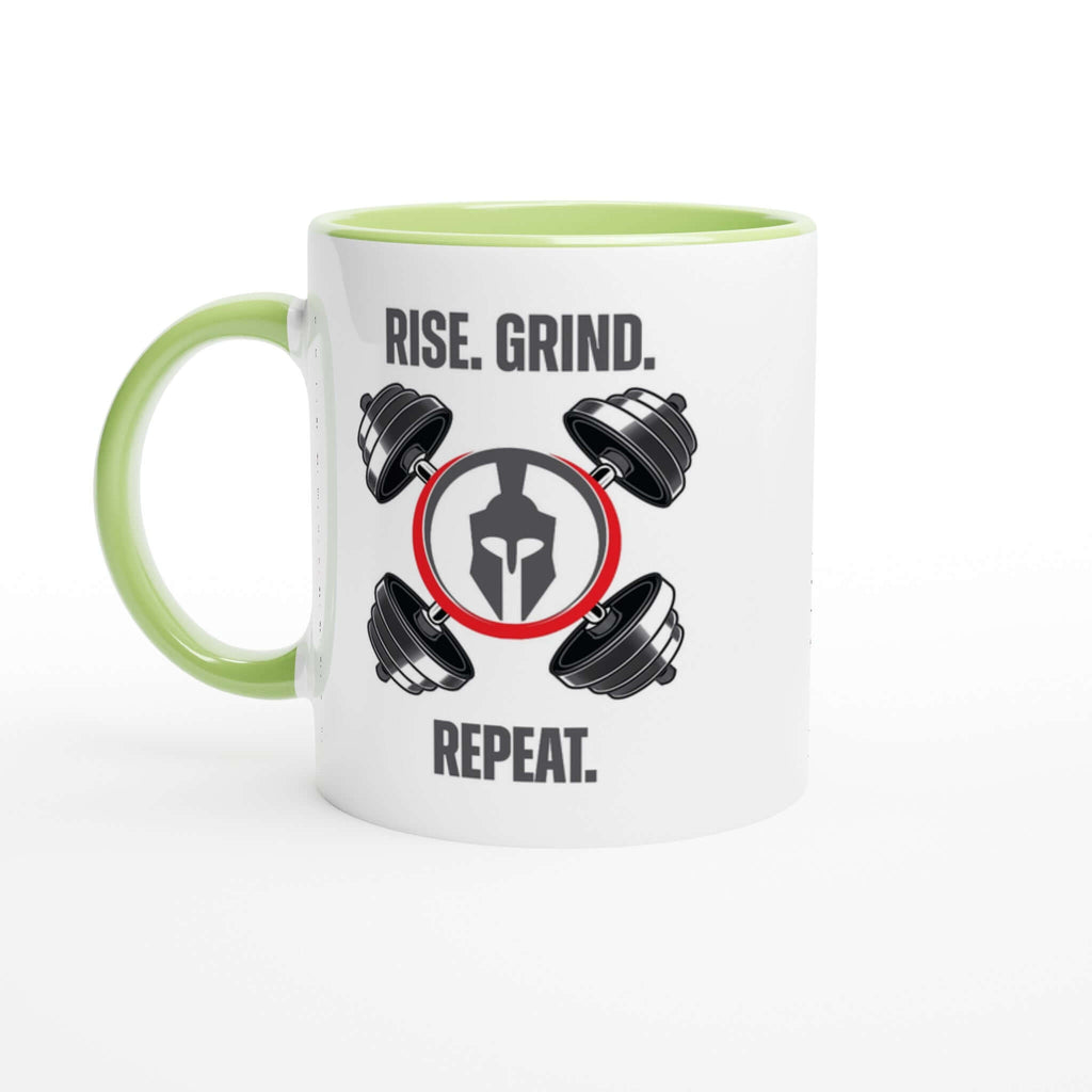 "Rise. Grind. Repeat." 11oz ceramic mug with green handle and rim, featuring motivational text and weightlifting design, perfect for daily inspiration